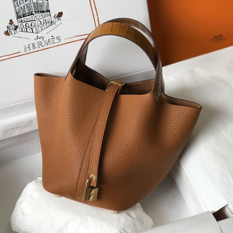 H**mes shopping bags